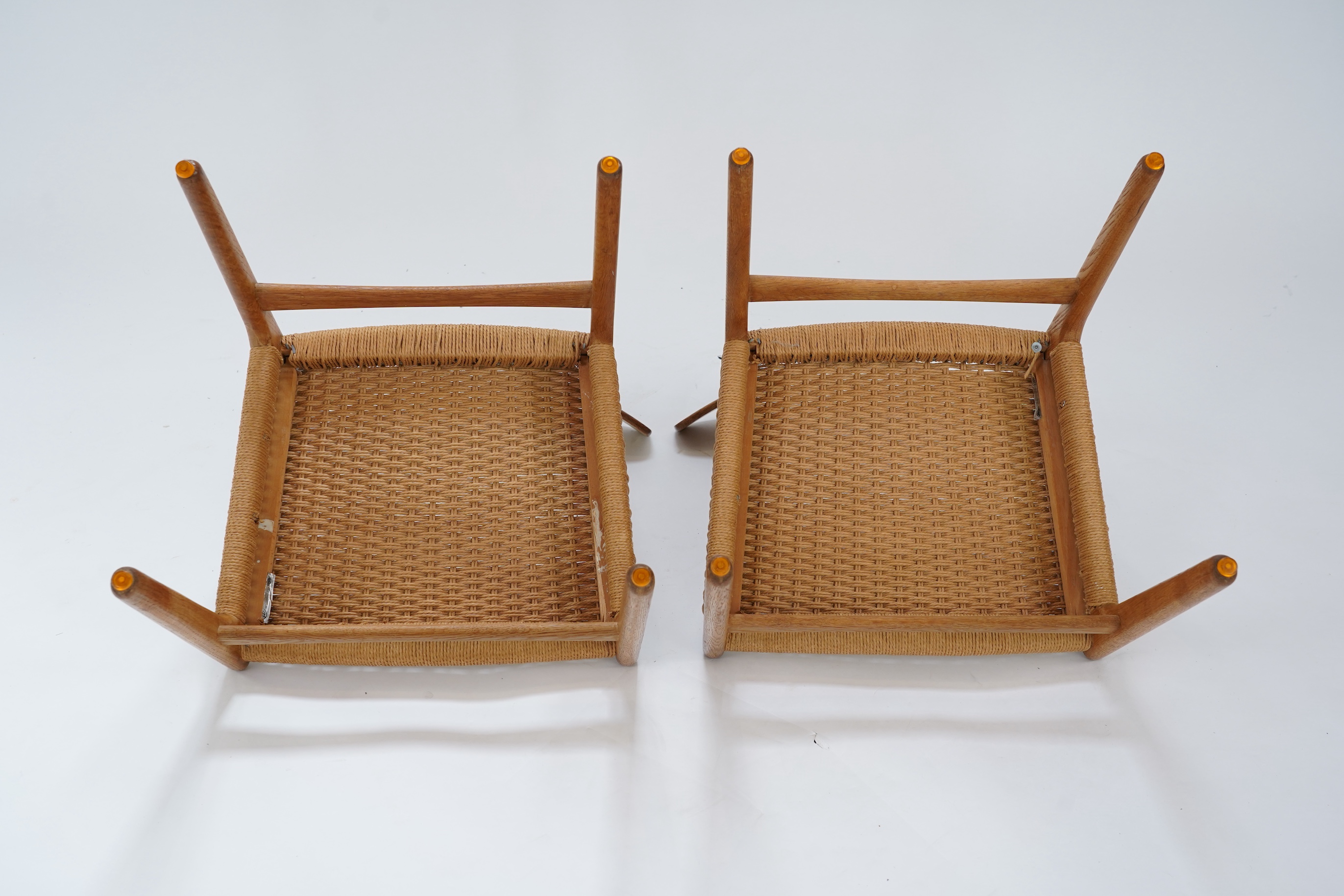 Hans Jørgensen Wegner (Danish, 1914-2007) for Carl Hansen & Søn Møbelfabrik : Two oak 'CH23' dining chairs